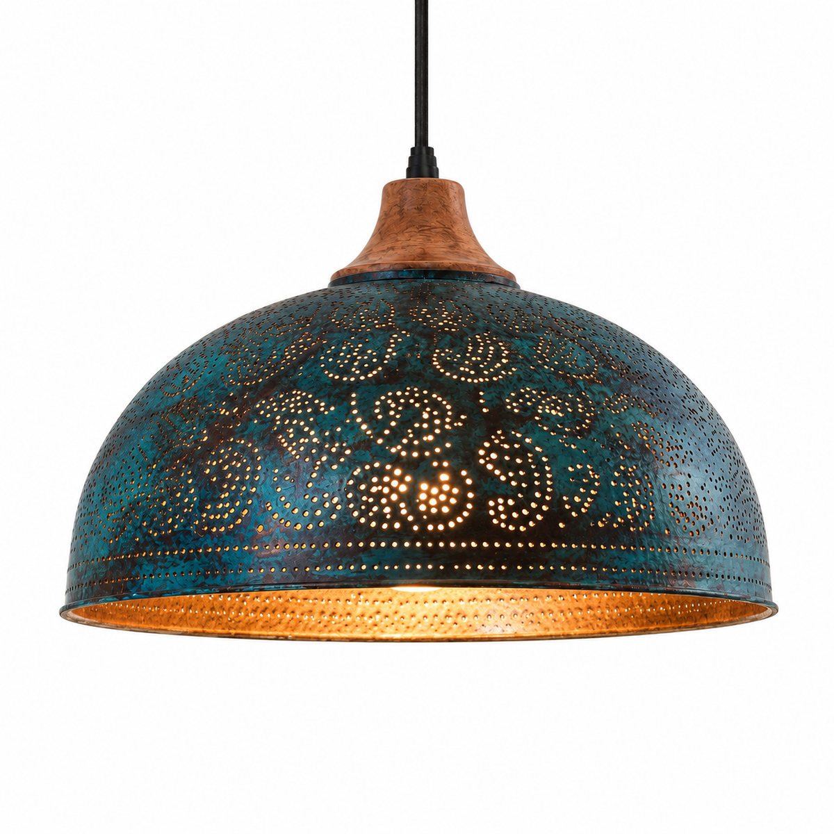 A dome-shaped metal pendant light with a distressed teal and bronze finish, featuring intricate laser-cut circular patterns on the shade and a warm copper-toned interior, suspended by a black cord against a white background.