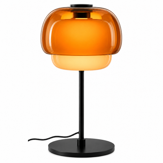 A modern table lamp with a glossy amber-orange glass dome shade and a matte black metal base and stem, shown on a plain white background.