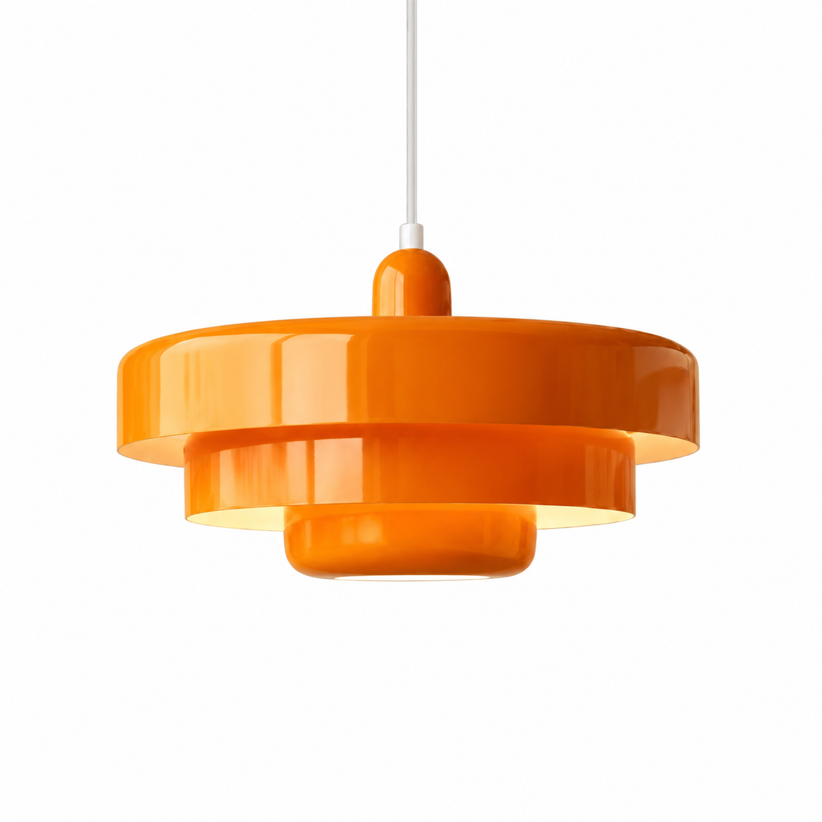An orange glossy multi-tiered pendant light hanging from a white cord against a plain white background.